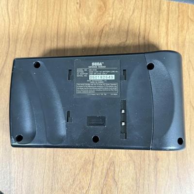 LOT 79B: Vintage Sega Genesis Nomad Video Game System Model MK-6100 w/ 7 Games - Sonic, Pacman, Beavis and Butthead