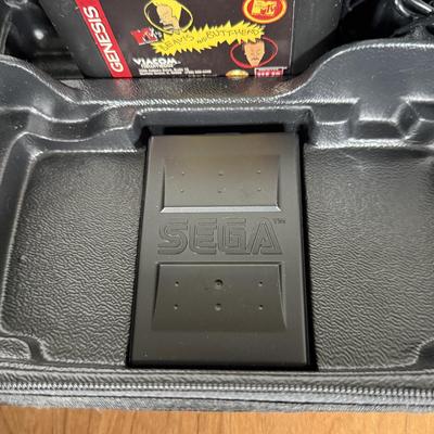 LOT 79B: Vintage Sega Genesis Nomad Video Game System Model MK-6100 w/ 7 Games - Sonic, Pacman, Beavis and Butthead