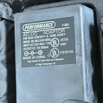 LOT 79B: Vintage Sega Genesis Nomad Video Game System Model MK-6100 w/ 7 Games - Sonic, Pacman, Beavis and Butthead