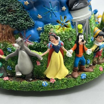 LOT 107B: Disney Snow Globes! Silver Screen Debut, 2000 Millennium & 100th Birthday