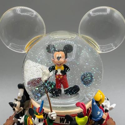 LOT 109B: Mickey Mouse Timeline & Over The Years Musical Snow Globes