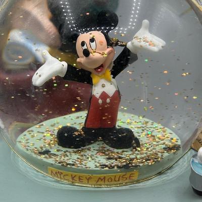 LOT 109B: Mickey Mouse Timeline & Over The Years Musical Snow Globes