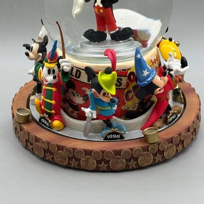 LOT 109B: Mickey Mouse Timeline & Over The Years Musical Snow Globes