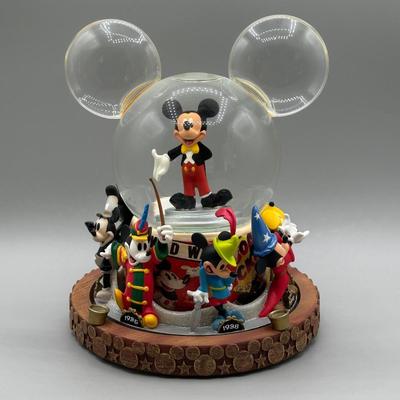 LOT 109B: Mickey Mouse Timeline & Over The Years Musical Snow Globes