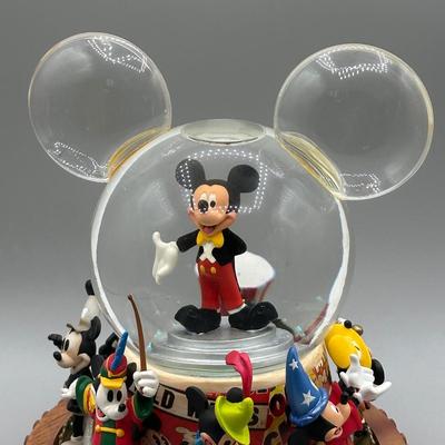 LOT 109B: Mickey Mouse Timeline & Over The Years Musical Snow Globes