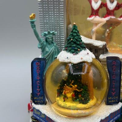 LOT 123B: Radio City Christmas Spectacular Snow Globe & Elvis Anniversary Clock