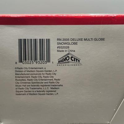 LOT 123B: Radio City Christmas Spectacular Snow Globe & Elvis Anniversary Clock