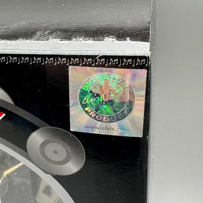 LOT 123B: Radio City Christmas Spectacular Snow Globe & Elvis Anniversary Clock