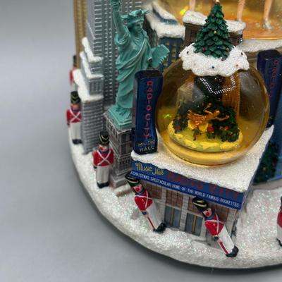 LOT 123B: Radio City Christmas Spectacular Snow Globe & Elvis Anniversary Clock