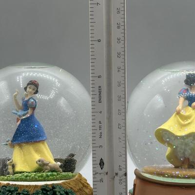 LOT: 144B: Disney x Enesco Waltz Of The Flowers & Listen To The Mocking Bird Musical Snow Globes