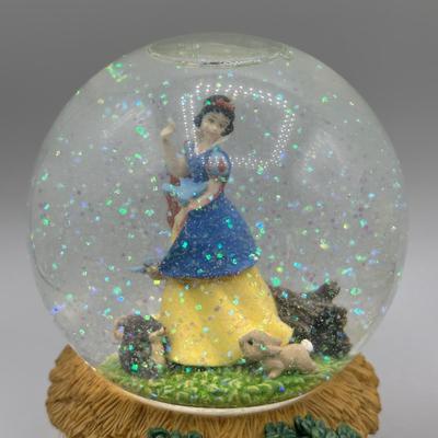 LOT: 144B: Disney x Enesco Waltz Of The Flowers & Listen To The Mocking Bird Musical Snow Globes