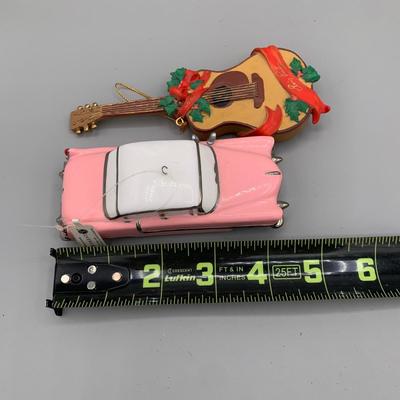 LOT 169 A: Elvis Presley Ornament Collection: Department 56 "Elvis Presley's Graceland", 1955 Cadillac Fleetwood, & More