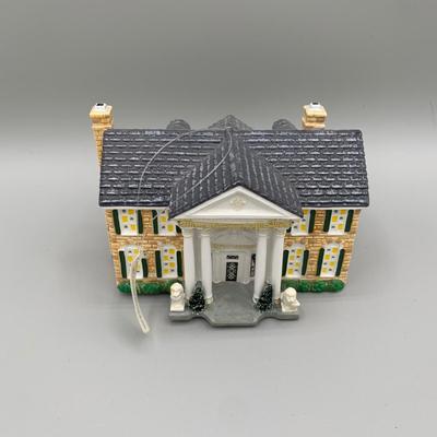 LOT 169 A: Elvis Presley Ornament Collection: Department 56 "Elvis Presley's Graceland", 1955 Cadillac Fleetwood, & More