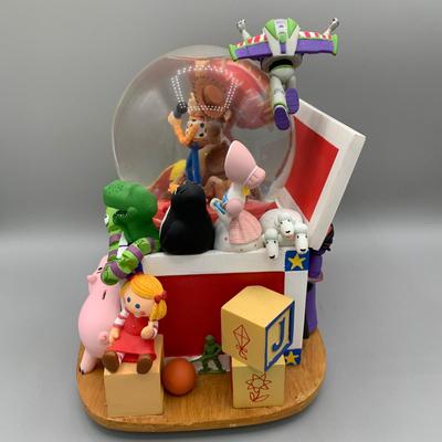 LOT 179 B: Disney 1995 Toy Story "Andy's Toy Box" Musical Snowglobe Tune "You've Got A Friend In Me"