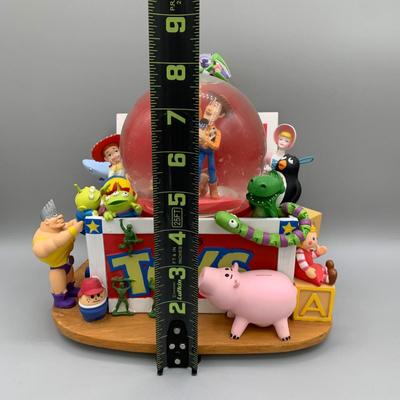LOT 179 B: Disney 1995 Toy Story "Andy's Toy Box" Musical Snowglobe Tune "You've Got A Friend In Me"
