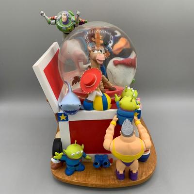 LOT 179 B: Disney 1995 Toy Story "Andy's Toy Box" Musical Snowglobe Tune "You've Got A Friend In Me"