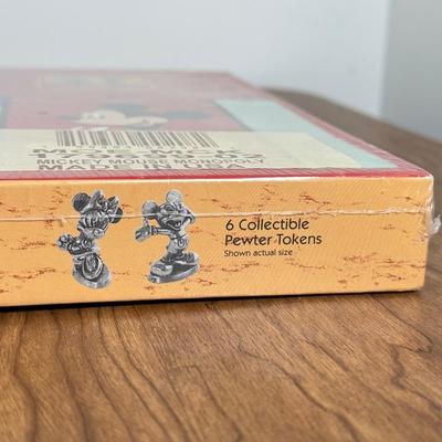 LOT 221B: Collection of Disney Games & Puzzles - Sealed Mickey Mouse Monopoly, Dominoes, Sealed Upper Deck Treasures Collectible...