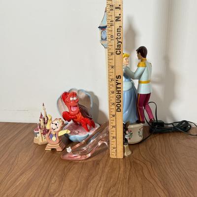 LOT 230B: Disney Trinkets - 2000 Mr. Christmas Cinderella Musical Figure, Sebastian Statue, Pink Glass Slipper, 2002 Beauty and the Beast...