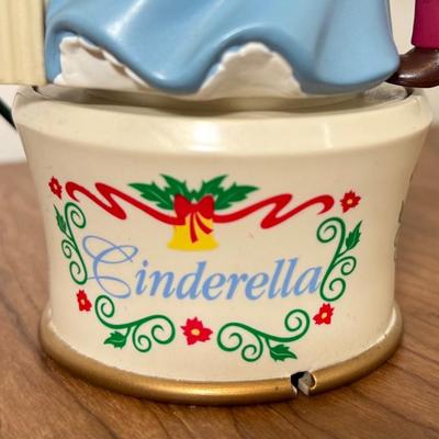 LOT 230B: Disney Trinkets - 2000 Mr. Christmas Cinderella Musical Figure, Sebastian Statue, Pink Glass Slipper, 2002 Beauty and the Beast...