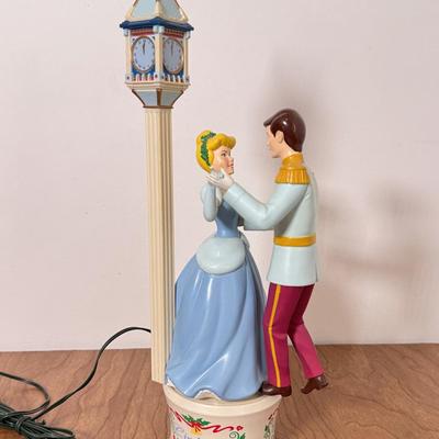 LOT 230B: Disney Trinkets - 2000 Mr. Christmas Cinderella Musical Figure, Sebastian Statue, Pink Glass Slipper, 2002 Beauty and the Beast...