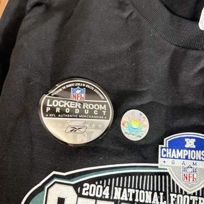 LOT 238A: Philadelphia Eagles Clothing, Hats & Footballs incl. 2004 NFC Champions Merch