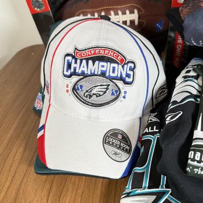 LOT 238A: Philadelphia Eagles Clothing, Hats & Footballs incl. 2004 NFC Champions Merch