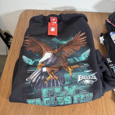 LOT 238A: Philadelphia Eagles Clothing, Hats & Footballs incl. 2004 NFC Champions Merch