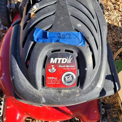 Mtd mower, has compression