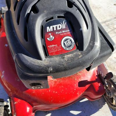 Mtd mower, has compression