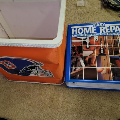 Big book on home repairs and bronco trash can