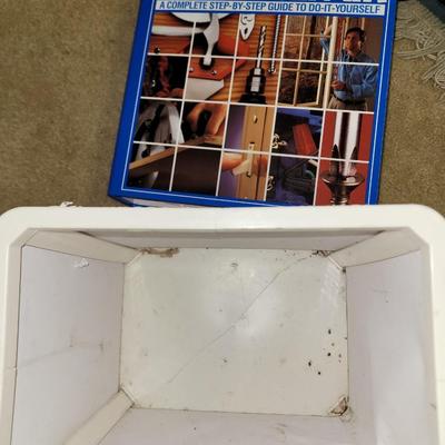 Big book on home repairs and bronco trash can