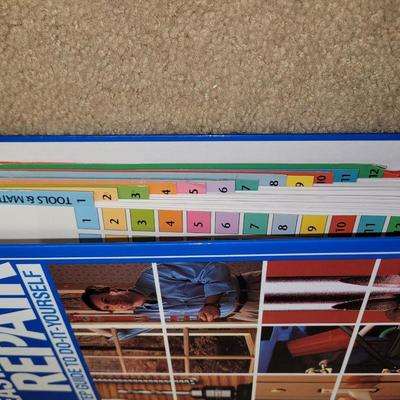 Big book on home repairs and bronco trash can