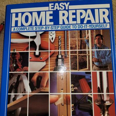 Big book on home repairs and bronco trash can