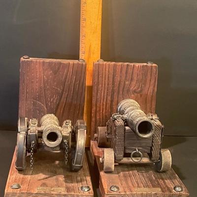 LOT; 1 Rustic Wooden Bookends with Cannon Repllcas, Brass Eagle Medallion, Stars and Stripes Drinking Glasses, Variety of Coffee Table...