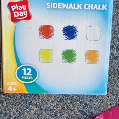 Summer kid toys and sidewalk Chalk