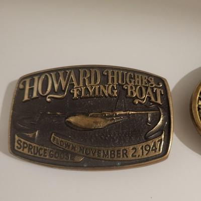 HOWARD HUGHES FLYING BOAT AND PEARL HARBOR BELT BUCKLES