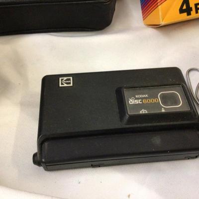 Polaroid, Kodak Disc With One Disc Film, and Box Cameras