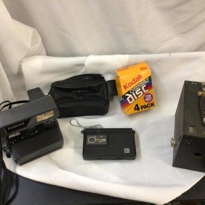 Polaroid, Kodak Disc With One Disc Film, and Box Cameras