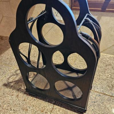 Nice wooden wine rack with wine themed plate and two stemmed glasses