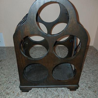 Nice wooden wine rack with wine themed plate and two stemmed glasses