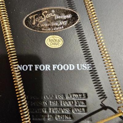 Nice wooden wine rack with wine themed plate and two stemmed glasses