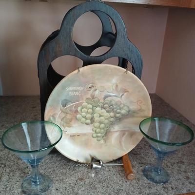 Nice wooden wine rack with wine themed plate and two stemmed glasses