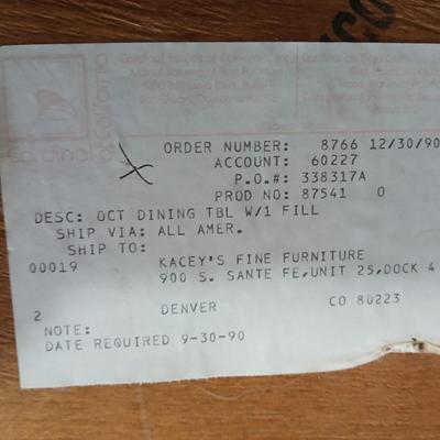 Oak Kitchen table with leaf and four upholstered chairs on casters