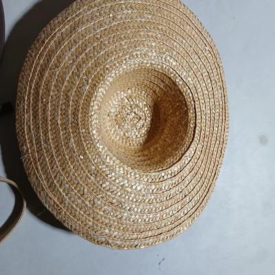 Two hats, each with a purse