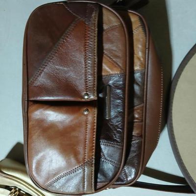 Two hats, each with a purse