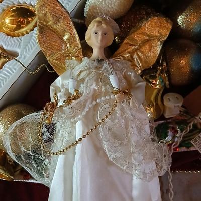 Large faux Christmas tree with skirt, ornaments, greenery, Angel, lights and more !