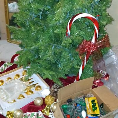 Large faux Christmas tree with skirt, ornaments, greenery, Angel, lights and more !