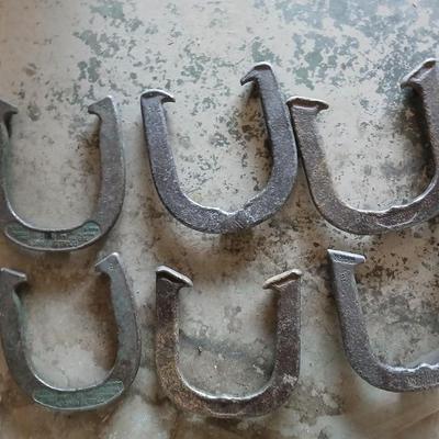 Three sets of vintage metal Horsehoe game shoes
