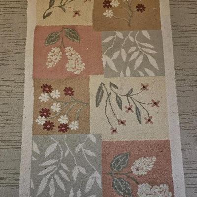 Area rug with a matching throw rug