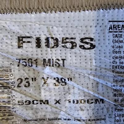 Area rug with a matching throw rug